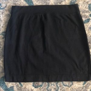 Black Victoria’s Secret mini skirt.